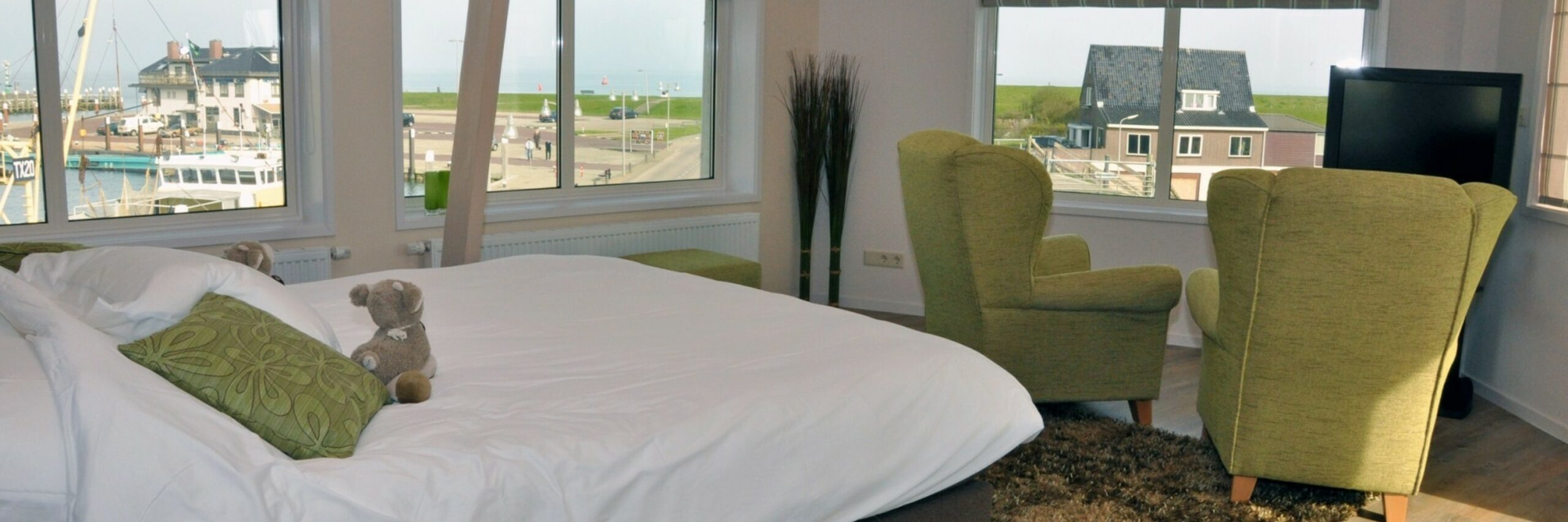 Slaapkamer De Schapenboet bij hotel Havenzicht VVV Texel
